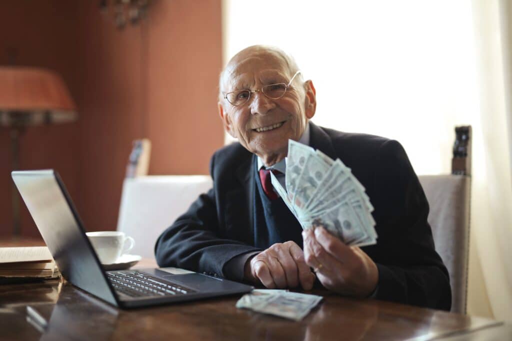 happy-old-man-with-money